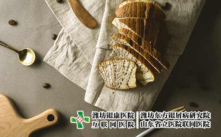 摄图网_500601411_餐桌上的面包与餐具（企业商用）饮食